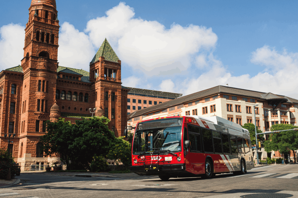 a bus drives past the courthouse