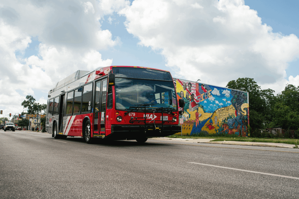 bus in an urban area on a partly cloudy day